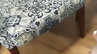 Foot Slave Under Tha Table