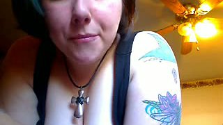 Busty emo babe shows her huge tits over the webcam