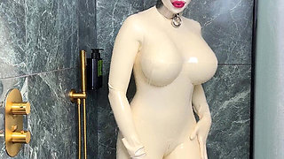 Latex Cow Undressing Under the Shower