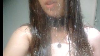 Hot teen taking shower wearing a white lingerie