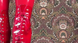 Red Ballet Boots on Wooden Floor