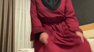 Fatima dancing in hotel room