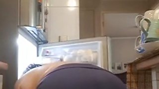 Stepmom in the kitchen on tits