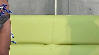 College Girl's Game of Hitting Clothespins with a Whip to Remove Them